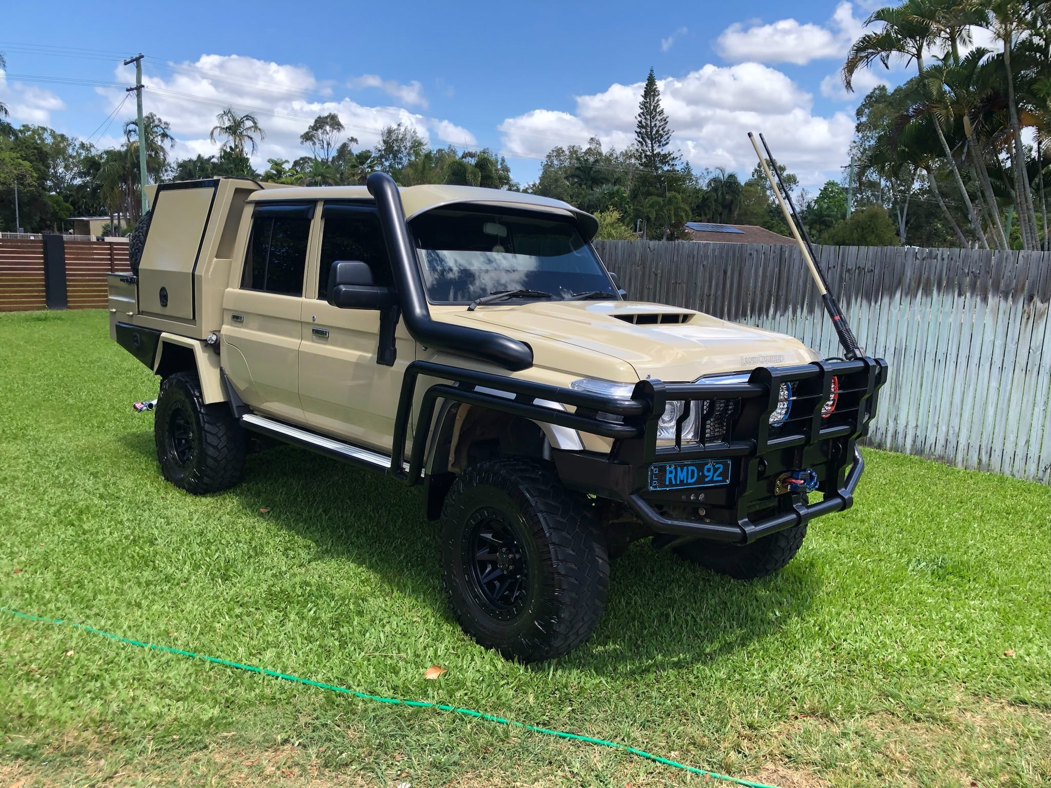 Toyota LandCruiser 79 Series fully detailed on grass in Brisbane